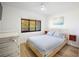 Bedroom with a queen bed and a view at 1515 Pinellas Bayway S # B28, Tierra Verde, FL 33715