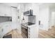 Modern kitchen with stainless steel appliances and breakfast bar at 1515 Pinellas Bayway S # B28, Tierra Verde, FL 33715