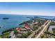 Aerial view of waterfront community with pool and tennis courts at 1515 Pinellas Bayway S # B28, Tierra Verde, FL 33715