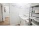 Bathroom with white vanity and a quote on the wall at 1515 Pinellas Bayway S # B28, Tierra Verde, FL 33715
