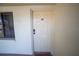 Exterior condo building entrance with door number B25 at 1515 Pinellas Bayway S # B28, Tierra Verde, FL 33715