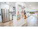 Modern kitchen features stainless steel appliances and white cabinetry at 1515 Pinellas Bayway S # B28, Tierra Verde, FL 33715