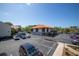 View of community parking lot with building at 1515 Pinellas Bayway S # B28, Tierra Verde, FL 33715