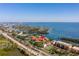 Aerial view of condo community by the water with tennis courts at 1515 Pinellas Bayway S # B28, Tierra Verde, FL 33715