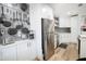 Modern kitchen with stainless steel appliances and ample storage at 1515 Pinellas Bayway S # B28, Tierra Verde, FL 33715