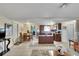 Inviting open-concept living space with dining area and kitchen, ideal for entertaining at 10801 Fillmore Ave, Port Richey, FL 34668