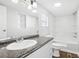 Clean bathroom with white vanity and tub shower combo at 3121 Briar St, Wesley Chapel, FL 33543