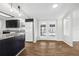 Updated kitchen with white appliances and breakfast bar at 3121 Briar St, Wesley Chapel, FL 33543