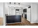 Eat-in kitchen with dark cabinetry and granite counters at 3121 Briar St, Wesley Chapel, FL 33543