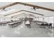 Large community hall with tables and chairs, perfect for events at 3121 Briar St, Wesley Chapel, FL 33543