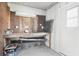 Workshop with pegboard walls, workbench, and shelving at 3121 Briar St, Wesley Chapel, FL 33543