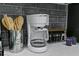 Kitchen counter with coffee maker and cooking utensils at 5221 Chaney Ter, Port Charlotte, FL 33981