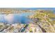 Expansive aerial view of a coastal community with waterfront homes and lush landscaping at 5346 Quist Dr, Port Richey, FL 34668