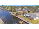 Waterfront property boasts a private dock and pier, perfect for boating enthusiasts at 5346 Quist Dr, Port Richey, FL 34668
