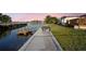 Beautiful waterfront featuring a dock and concrete seawall at 5346 Quist Dr, Port Richey, FL 34668