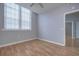 Bedroom with hardwood floors and access to bathroom at 701 Mirror Lake N Dr # 309, St Petersburg, FL 33701