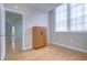 Bedroom with hardwood floors and vintage wardrobe at 701 Mirror Lake N Dr # 309, St Petersburg, FL 33701