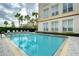 Refreshing swimming pool with ample deck space for lounging at 701 Mirror Lake N Dr # 309, St Petersburg, FL 33701