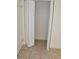 Well-lit closet with double doors and hanging rod at 11003 N 27Th St, Tampa, FL 33612