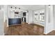 Modern kitchen with dark cabinetry and breakfast bar at 3121 Briar St, Wesley Chapel, FL 33543