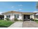 Single story home with covered carport and landscaping at 3121 Briar St, Wesley Chapel, FL 33543