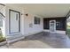 Covered carport with screened-in storage area at 3121 Briar St, Wesley Chapel, FL 33543