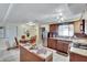 Eat-in kitchen with granite counters and stainless steel appliances at 10801 Fillmore Ave, Port Richey, FL 34668