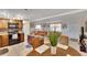 Kitchen with dark wood cabinets and a breakfast bar at 10801 Fillmore Ave, Port Richey, FL 34668