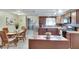 Kitchen with an island, granite countertops, and wood cabinets at 10801 Fillmore Ave, Port Richey, FL 34668