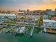 Aerial view of waterfront property and boat slips at 120 Brightwater Dr # 2, Clearwater Beach, FL 33767