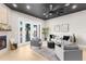 Comfortable living room with water views and plenty of natural light at 120 Brightwater Dr # 2, Clearwater Beach, FL 33767