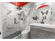 Modern bathroom with marble tile and a walk-in shower at 120 Brightwater Dr # 2, Clearwater Beach, FL 33767