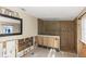 Bathroom features damaged walls, shower, mirror, and light fixture at 1786 Nevada Ne Ave, St Petersburg, FL 33703