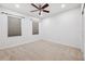 Well-lit bedroom featuring a ceiling fan and window blinds at 20213 Autumn Fern Ave, Tampa, FL 33647