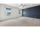 Large bedroom with ceiling fan and neutral wall color at 20213 Autumn Fern Ave, Tampa, FL 33647