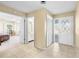 Bright entryway with tile flooring, access to bedroom and bathroom at 232 N Brockfield Dr, Sun City Center, FL 33573