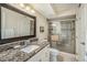 Bathroom featuring a granite countertop sink and glass shower at 6061 Bahia Del Mar Cir # 241, St Petersburg, FL 33715