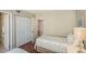 Bedroom with closet, ensuite bathroom, and comfortable twin beds at 6061 Bahia Del Mar Cir # 241, St Petersburg, FL 33715
