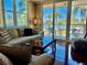 Comfortable living room with access to balcony, providing great waterfront views at 6061 Bahia Del Mar Cir # 241, St Petersburg, FL 33715