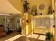 Condo lobby features decor, mailbox, seating and tiled floor at 6061 Bahia Del Mar Cir # 241, St Petersburg, FL 33715