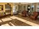 Condo lobby features elevator, seating, and tiled floor at 6061 Bahia Del Mar Cir # 241, St Petersburg, FL 33715