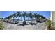 Ample parking with waterfront views in a community surrounded by mature palm trees at 6061 Bahia Del Mar Cir # 241, St Petersburg, FL 33715
