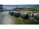 Aerial view of waterfront community with boat and golf course at 5505 Puerta Del Sol S Blvd # 122, St Petersburg, FL 33715