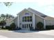 Attractive community center with large windows and inviting entrance at 8072 Green Pines Ter, Spring Hill, FL 34606