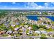 Aerial view of the house and surrounding neighborhood at 506 Lime Tree Ct, Sun City Center, FL 33573