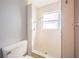 Clean shower with tile surround and a window at 8428 14Th N St, St Petersburg, FL 33702