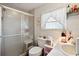 Bathroom with shower/tub combo and updated vanity at 37827 Mission Hills Ave, Zephyrhills, FL 33541