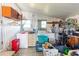 Laundry room with washer, dryer, and ample storage at 37827 Mission Hills Ave, Zephyrhills, FL 33541