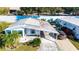 An aerial view of a manufactured home and its surroundings at 37827 Mission Hills Ave, Zephyrhills, FL 33541