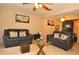 Living room with two sofas and a glass coffee table at 117 114Th N Ave # 117, St Petersburg, FL 33716